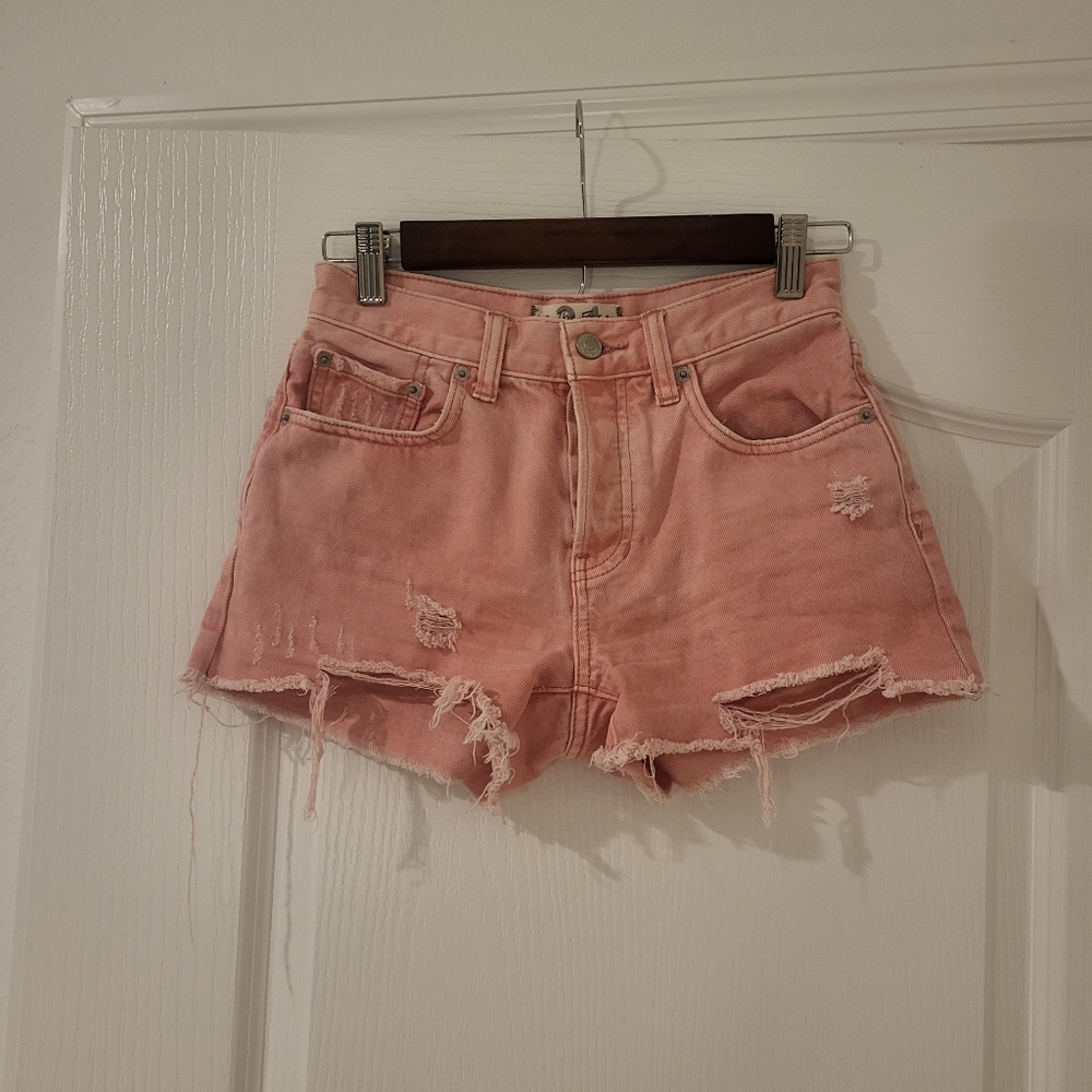 Free People Loving Good Vibrations pink cutoff denim shorts